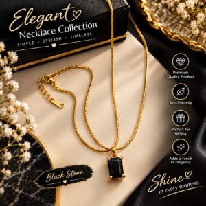 Elegant black stone pendant necklace with premium gold-tone chain displayed on a luxury background.